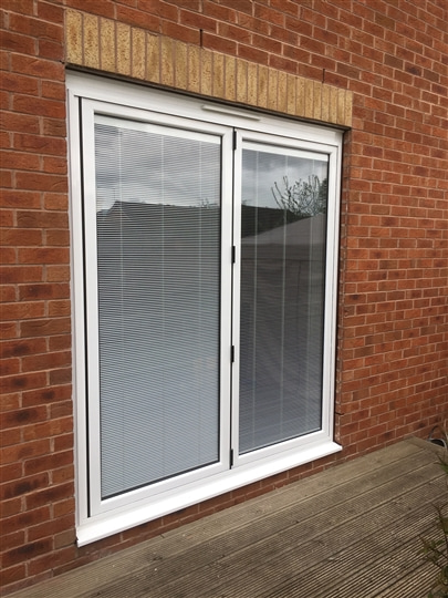 white aluminium bifold doors