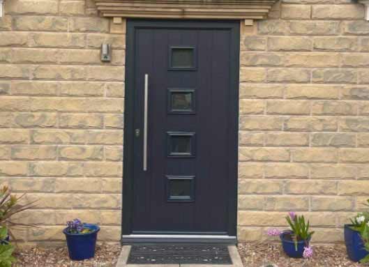 Composite front door in Anthracite Grey with four small windows