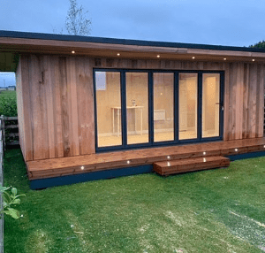 Summer House with Aluminium Bifold Door