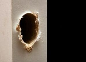 Hole in a Composite Door